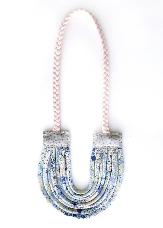 the daisy breastfeeding necklace